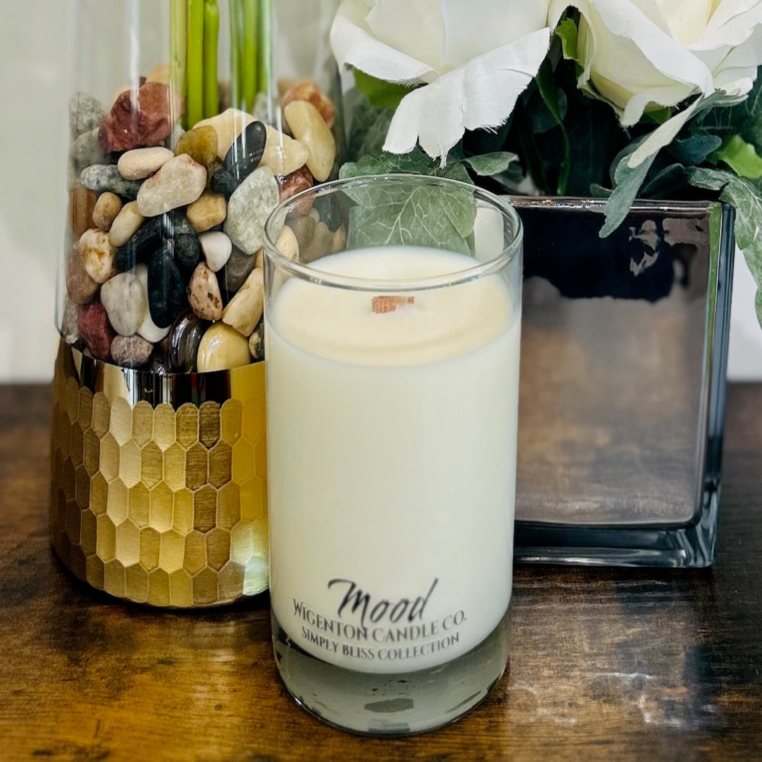 Soy Candle with Mood fragrance on a wooden surface