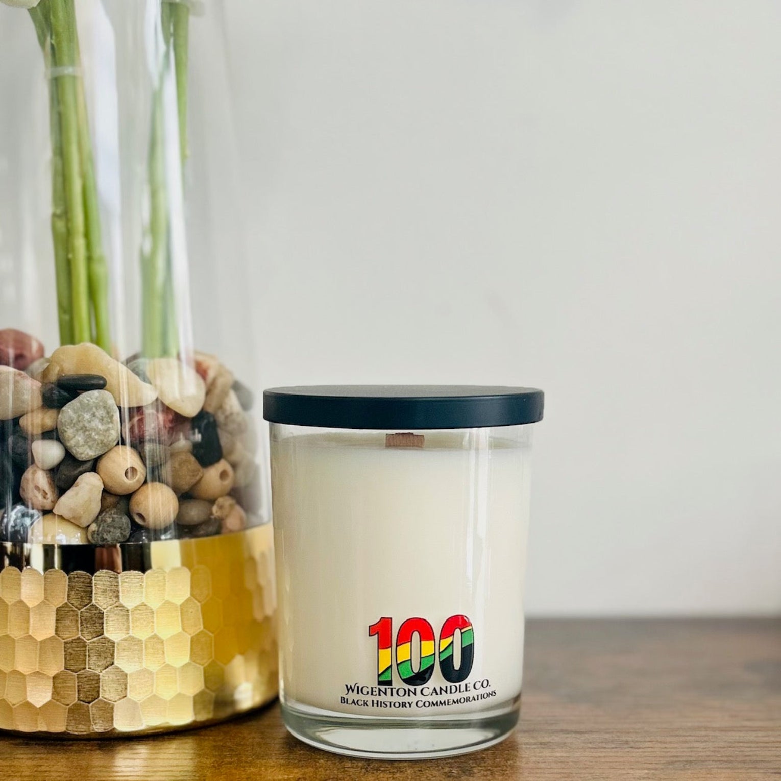 10 oz soy candle with 100 Black History Commemorations label in clear glass jar by Wigenton Candle Co.