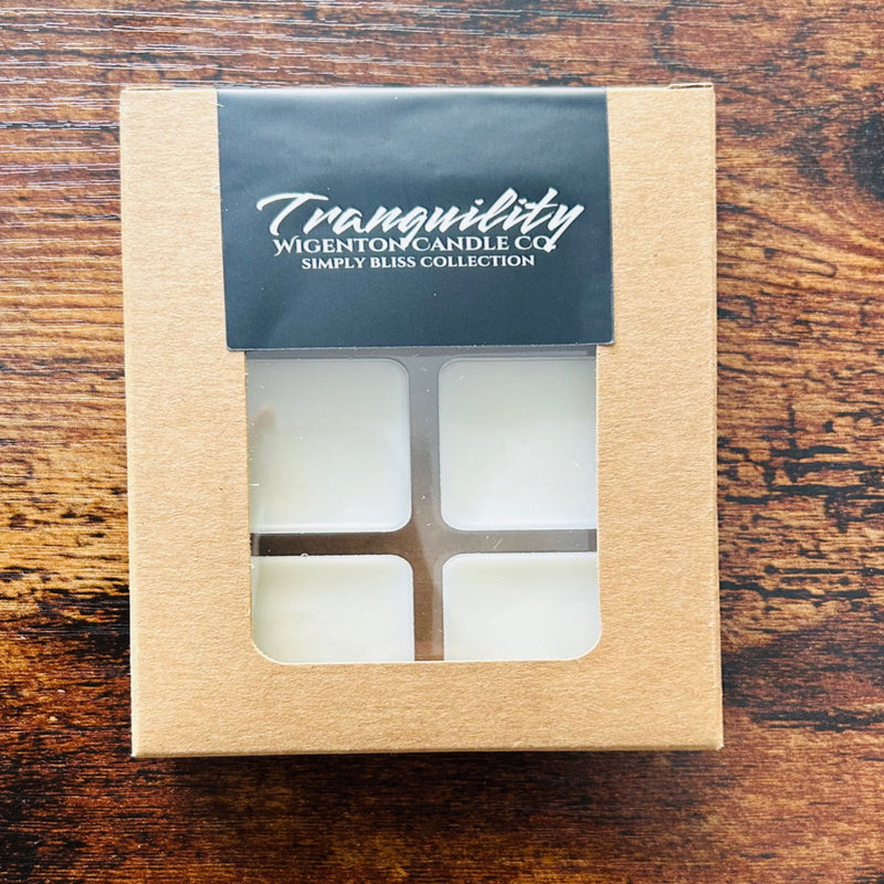 Box of Tranquility Wigenton Candle Co melts on a wooden surface