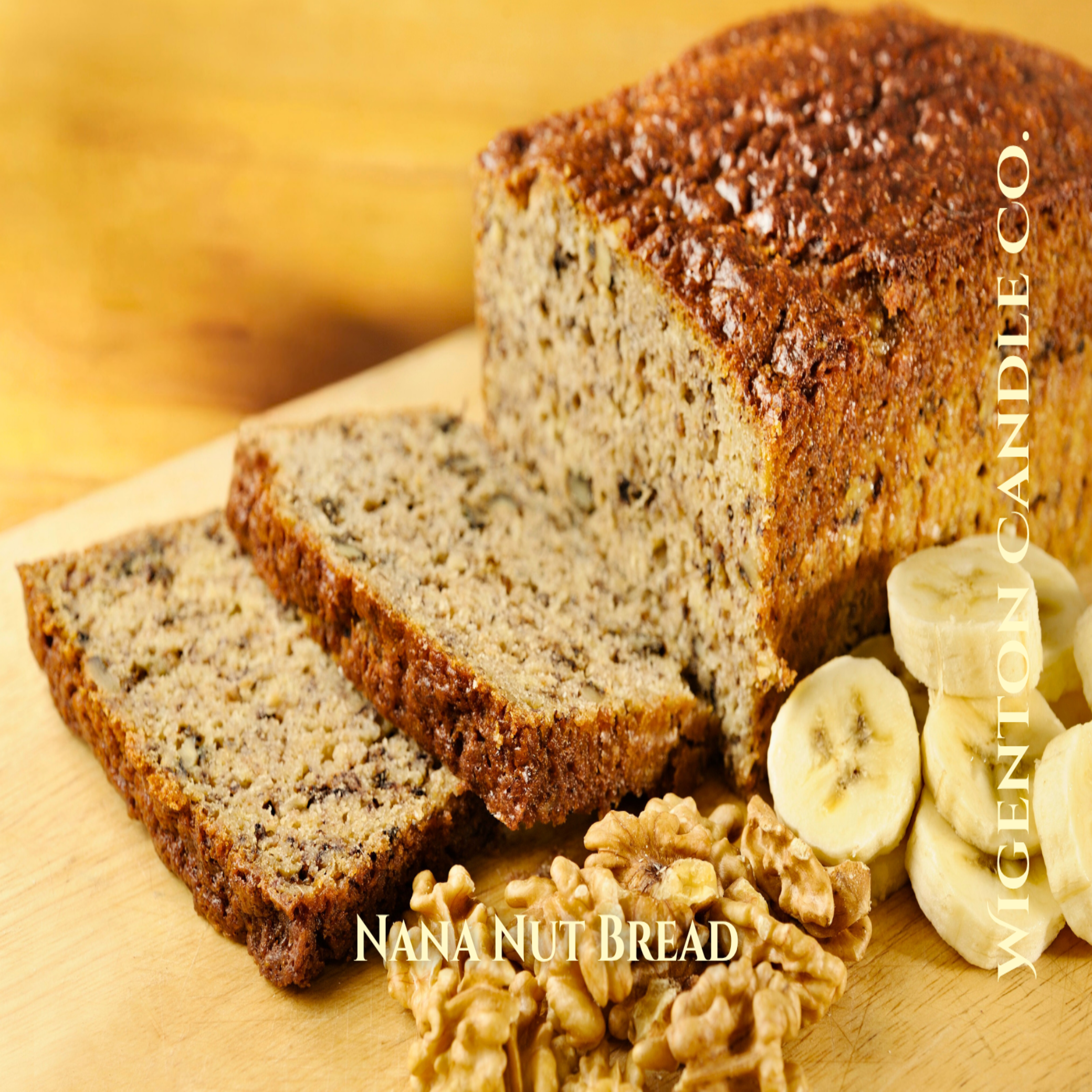 Loaf of banana bread with slices on a wooden board, surrounded by bananas and walnuts, with 'Nana Nut Bread' branding. This is a fragrance by Wigenton Candle Co. 