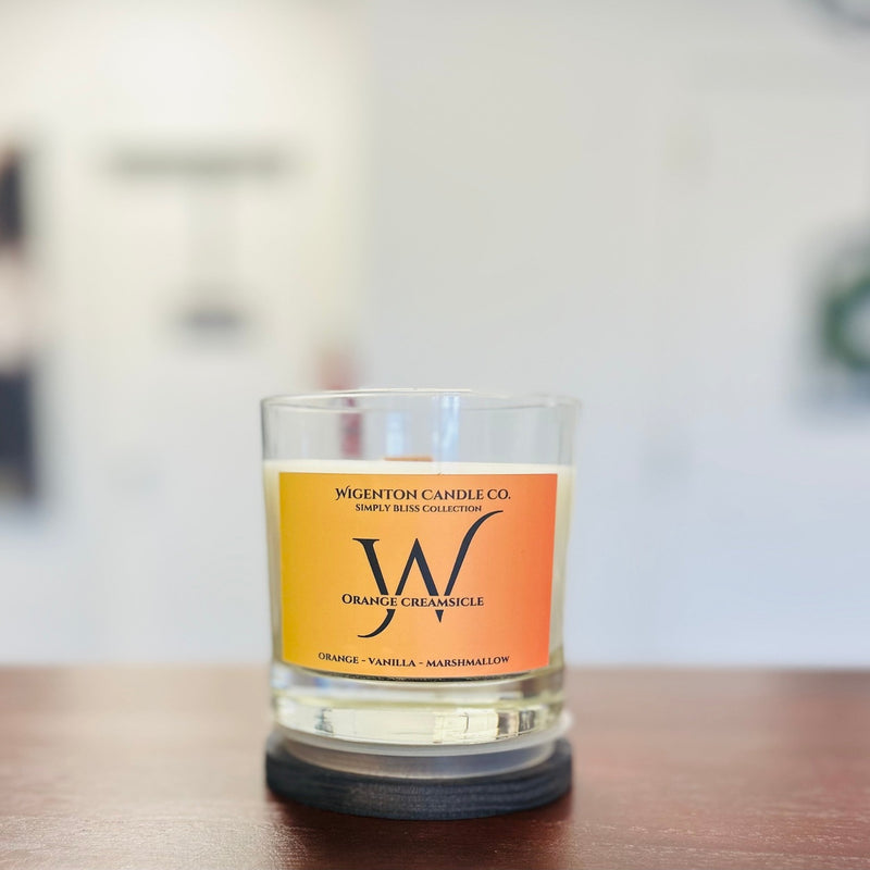 Indulge in the nostalgic burst of bright orange, followed by a heavenly creaminess of vanilla and marshmallow, perfectly complemented by a sugary touch. Let this fragrance transport you to a simpler time and fulfill your longing for a sweet and delightful treat with our 8 oz soy candle.