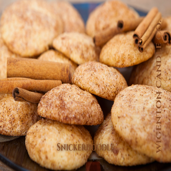 Snickerdoodle cookies with cinnamon sticks on a plate. This is a fragrance by Wigenton Candle Co. 