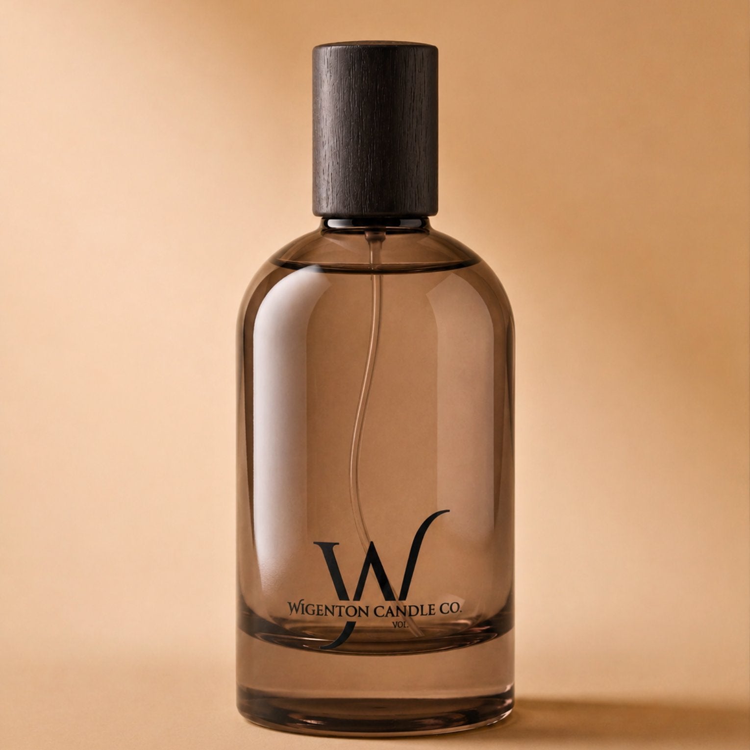 Wigenton Candle Co. room and linen fragrance mist in an amber glass bottle designed to freshen rooms, linens, and personal spaces