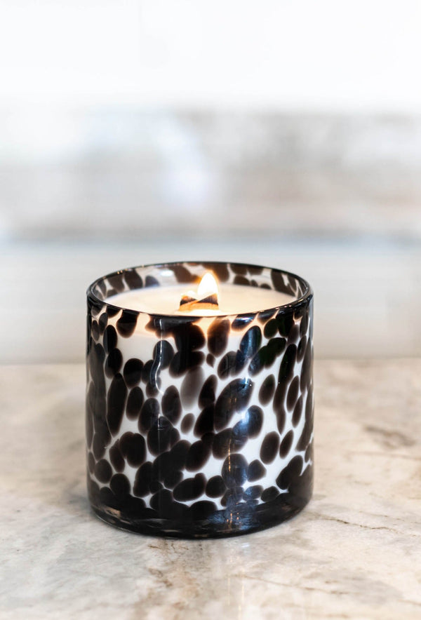 The 15oz filled handmade glass is extraordinarily unique and beautiful. No two pieces are identical.  The black color is deposited into the glass, rather than painted, making this piece both exclusive and durable.